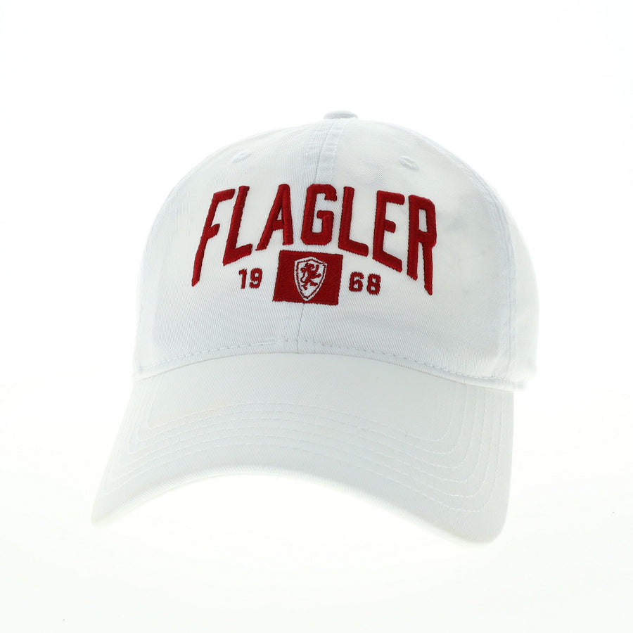 Red hat with white embroider saying Flagler over 19 Flagler College Shield logo 68