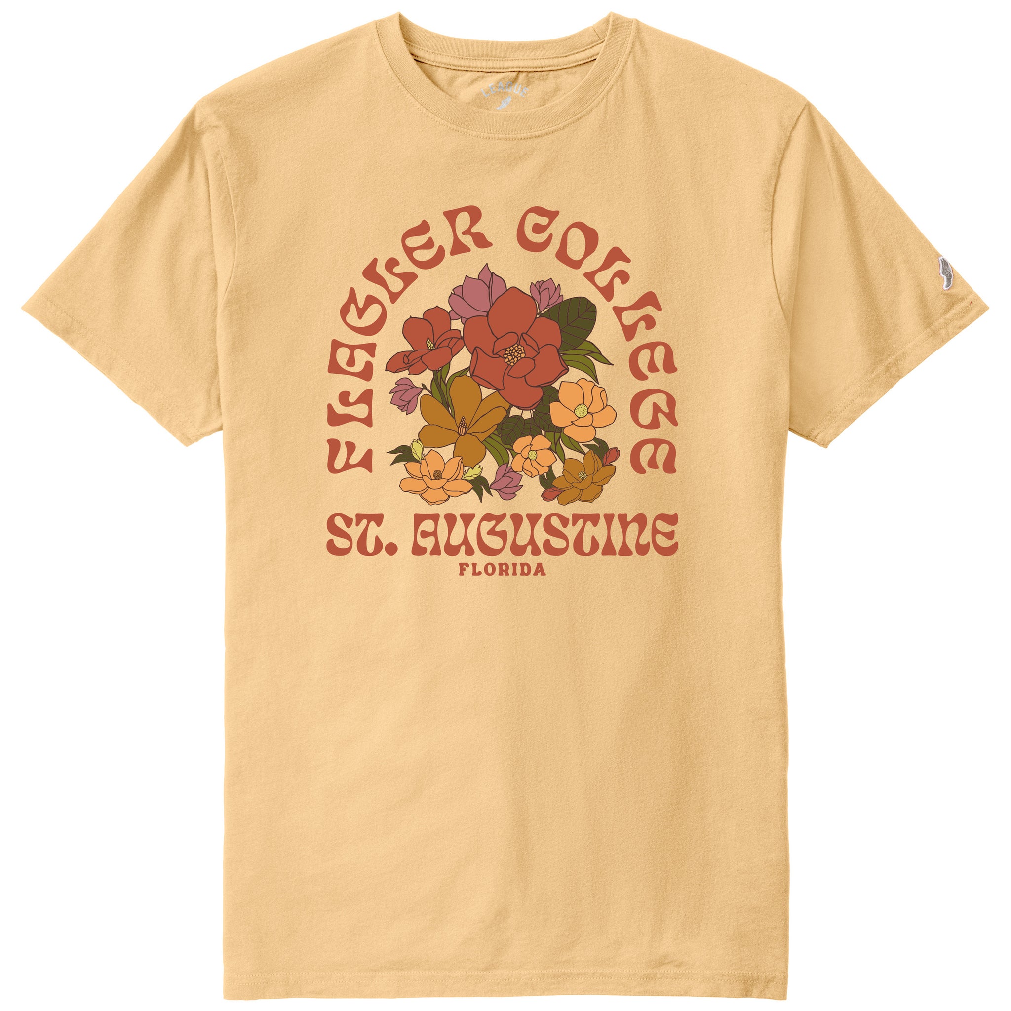 Golden yellow t-shirt with wildflower imprint in center of shirt with text around saying Flagler College St Augustine Florida