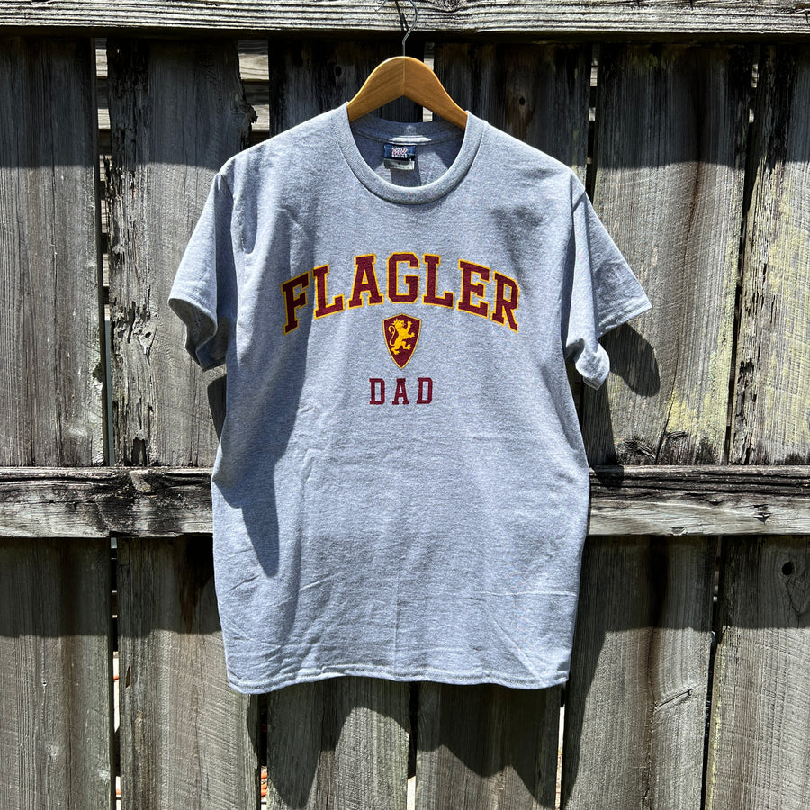 Grey t-shirt with crimson imprint outlines with yellow saying Flagler over Flagler shield logo over crimson imprint saying dad