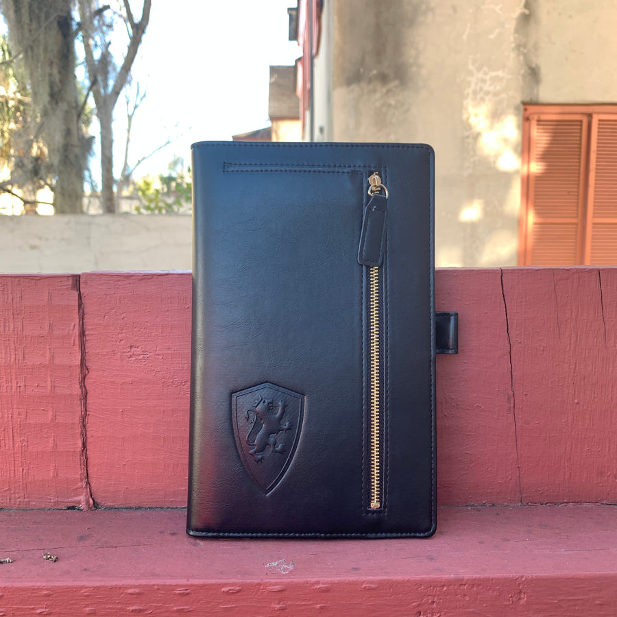rose gold padfolio and black padfolio with zipper on front and shield embossed on front