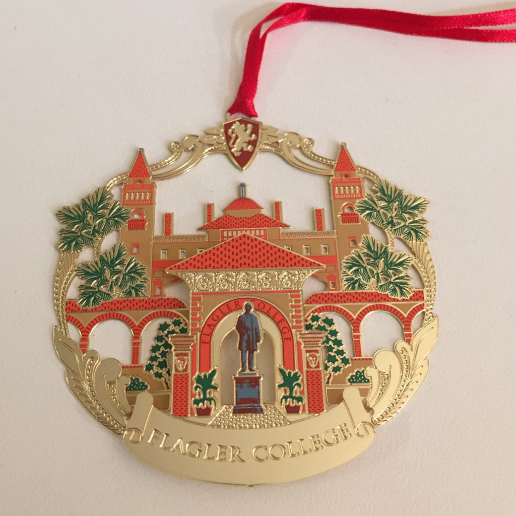 gold finished Flagler college building and Henry Flagler statue ornament