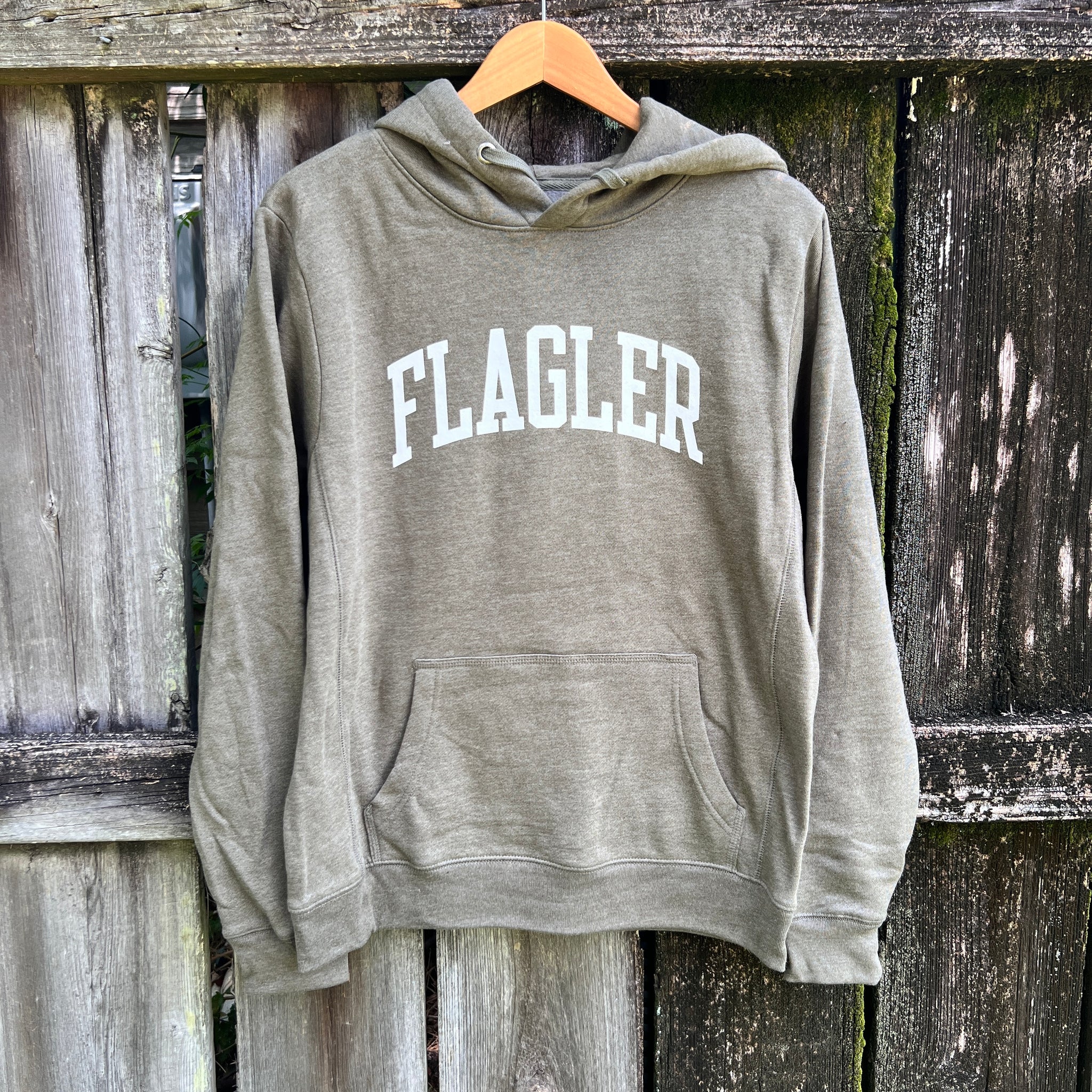 Olive solid hooded sweatshirt with white imprint saying Flagler