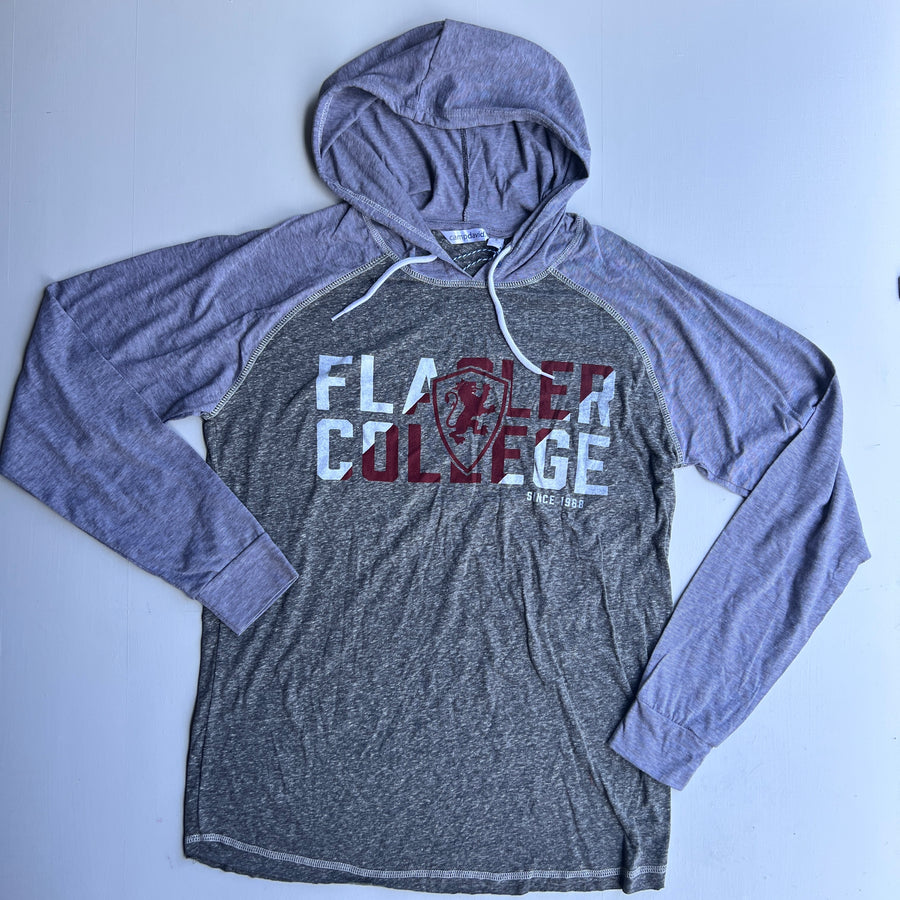 Zoomed in photo of hooded sweatshirt with white and crimson imprint saying Flagler over Flagler College shield logo over College over since 1968