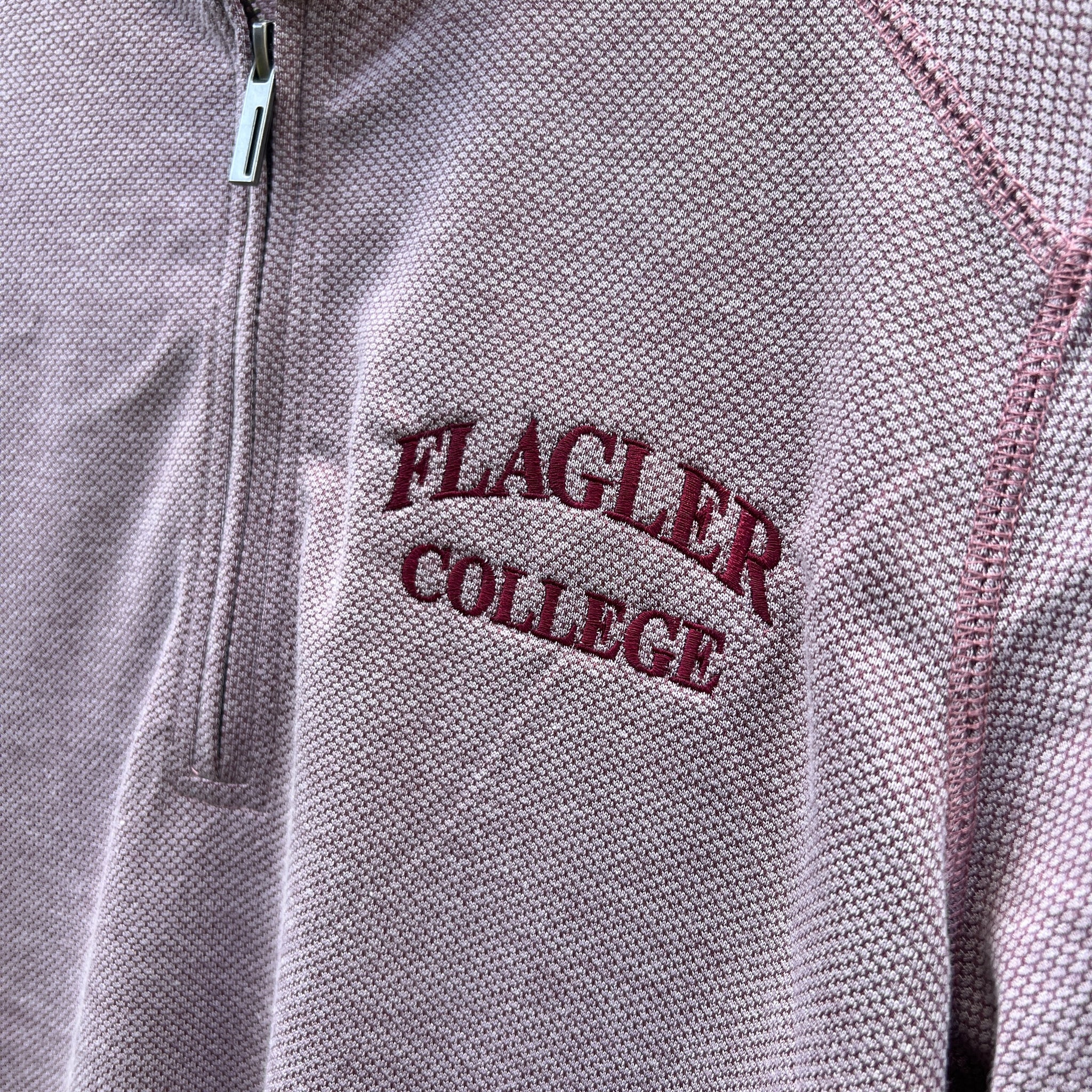 Zoomed in phot of darker crimson imprint saying Flagler over College