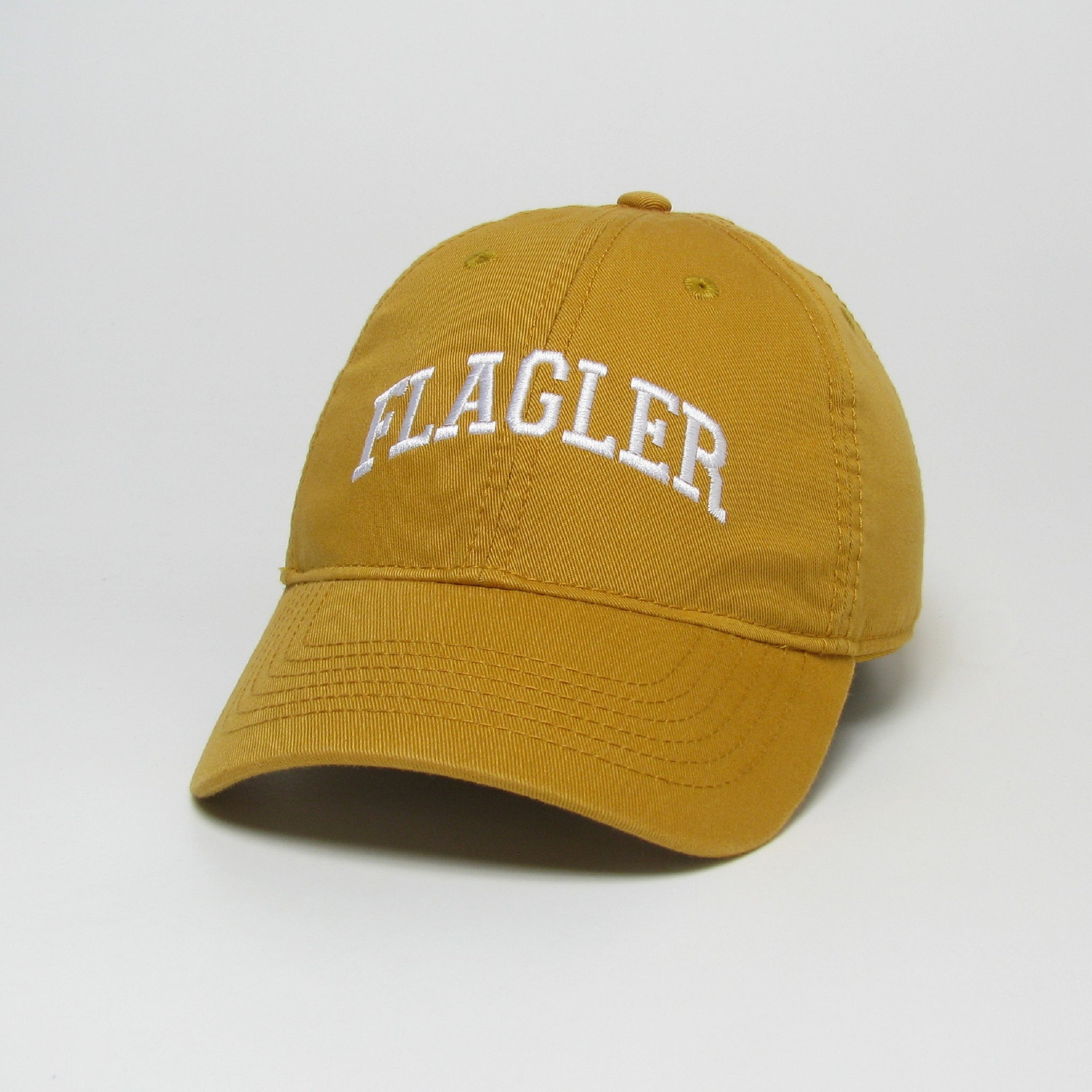gold hat with white embroider saying Flagler