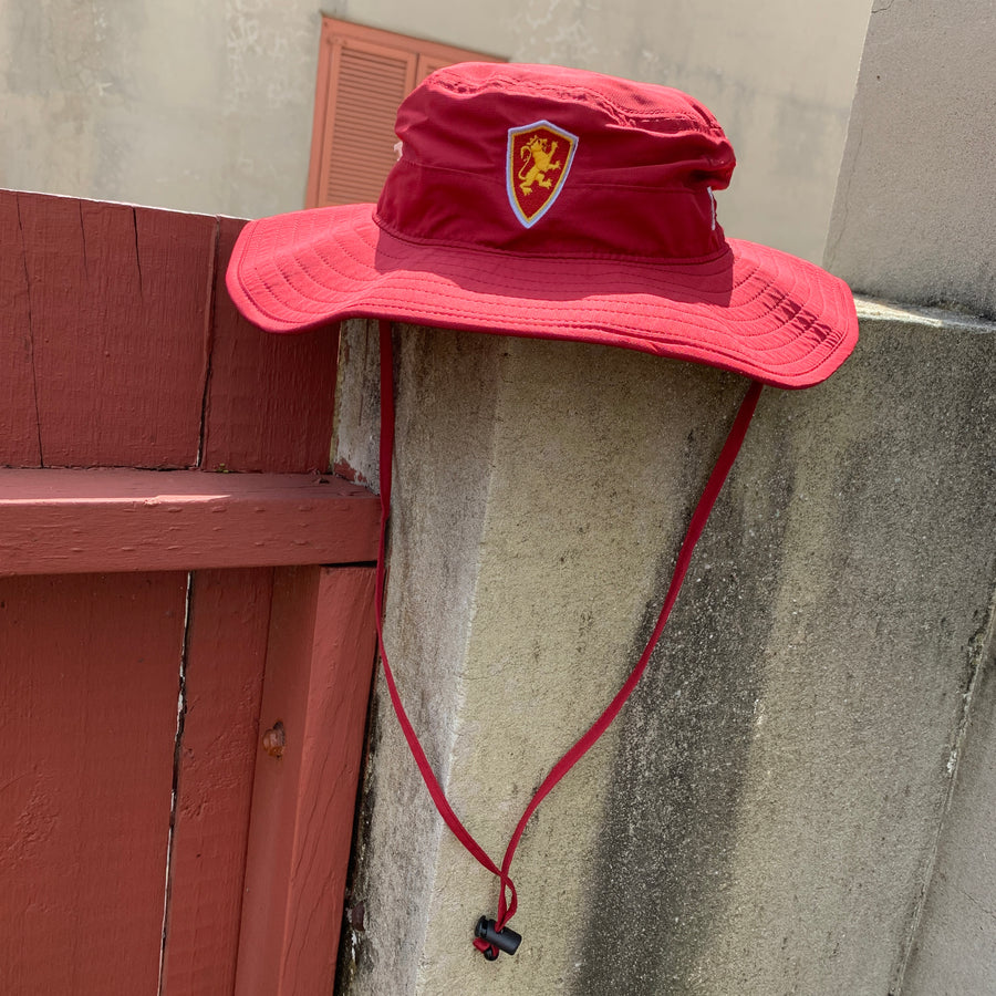 crimson red boonie with strap and flagler college shield logo. the game logo on side