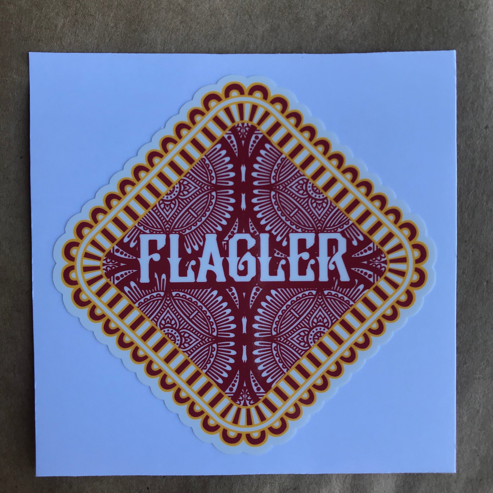 Flagler Diamond Sticker with red and yellow ornate patterns 