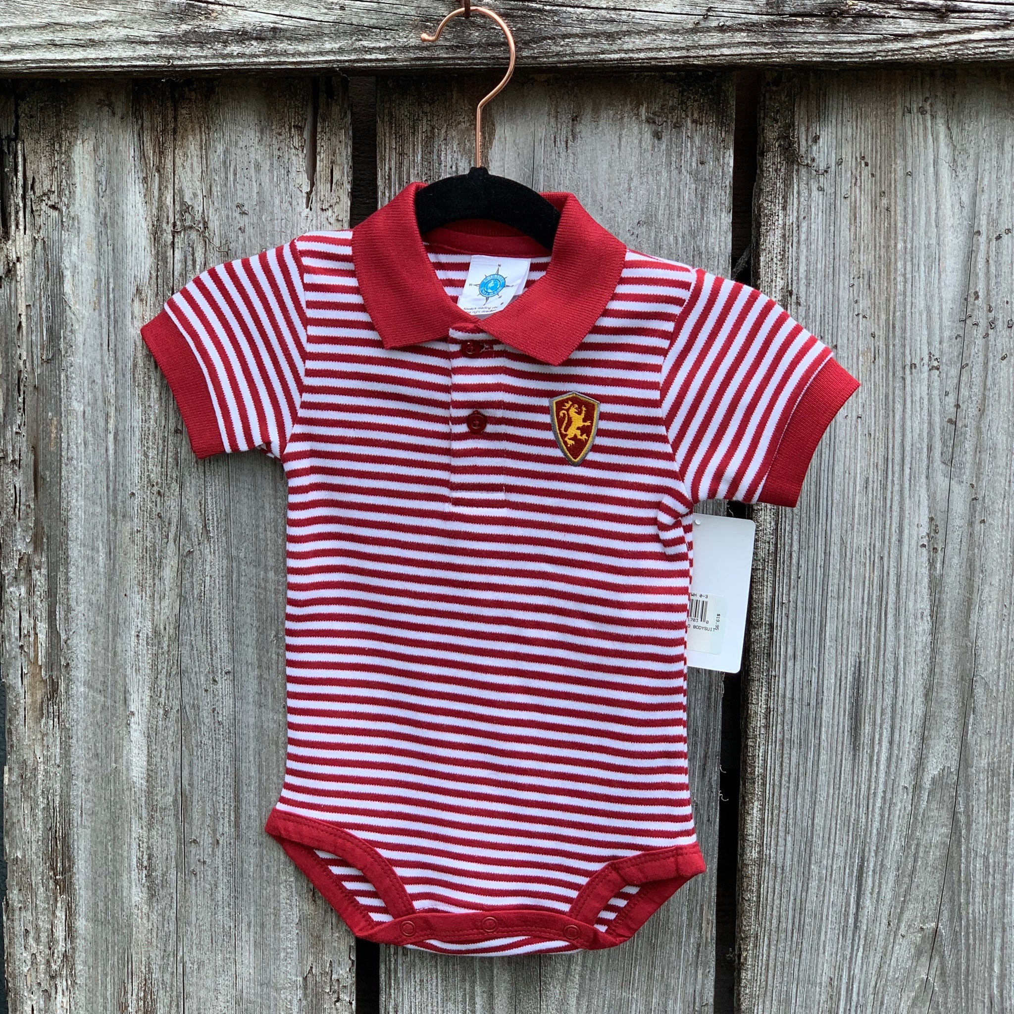 Baby onesie with polo cut. crimson and white stripes and Flagler College shield logo on left chest